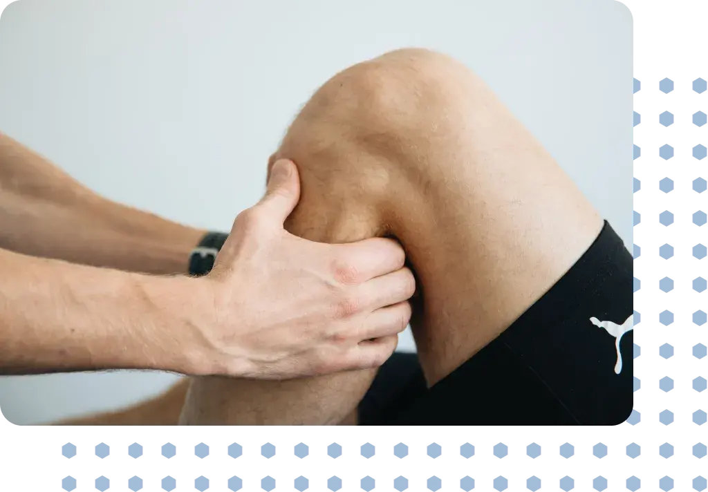 A man having an assessment of his knee