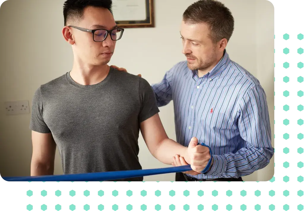 A man being taught home rehabilitations
exercises.