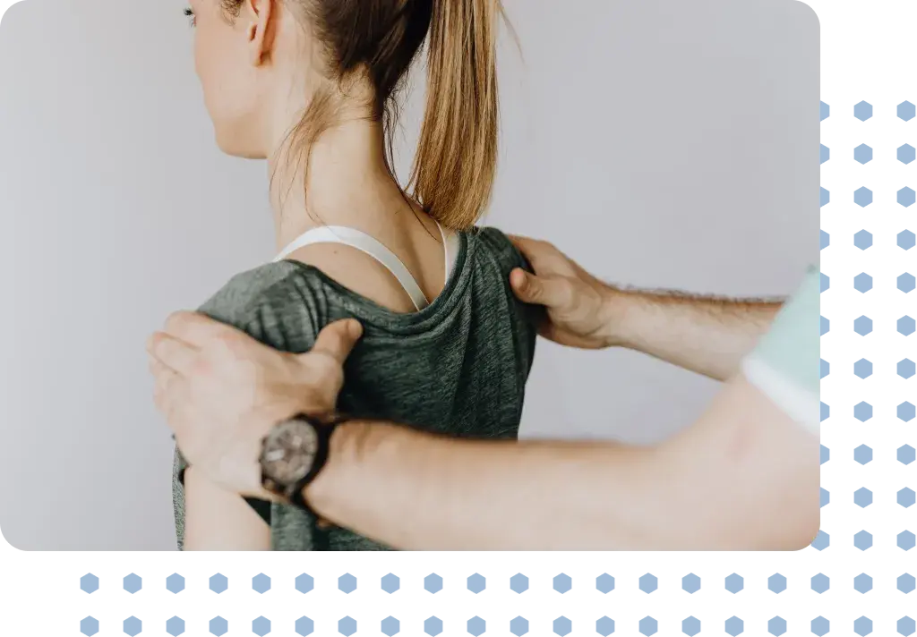 A woman having a spine assessment